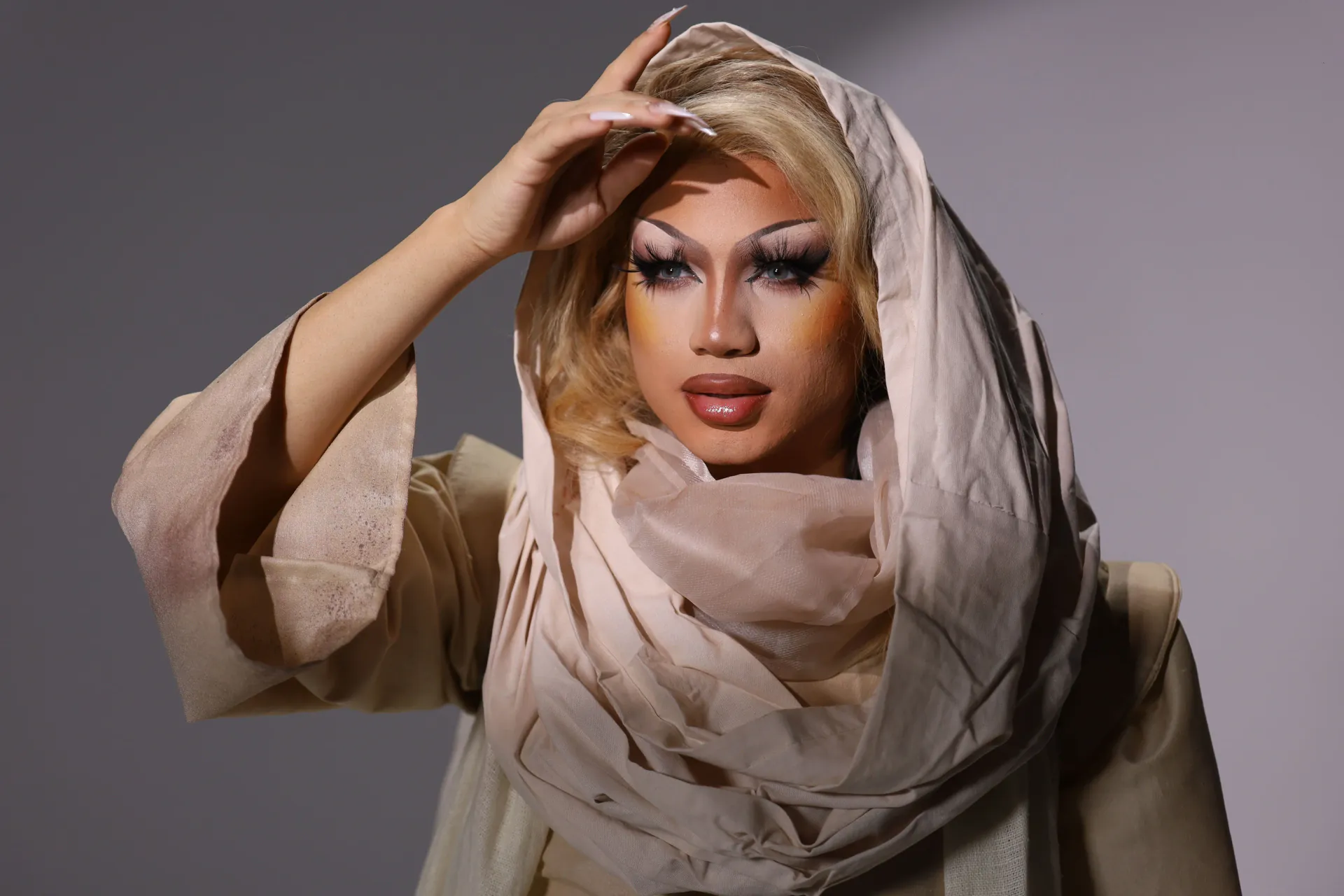 Freya Armani showcasing detailed glamour makeup and styling