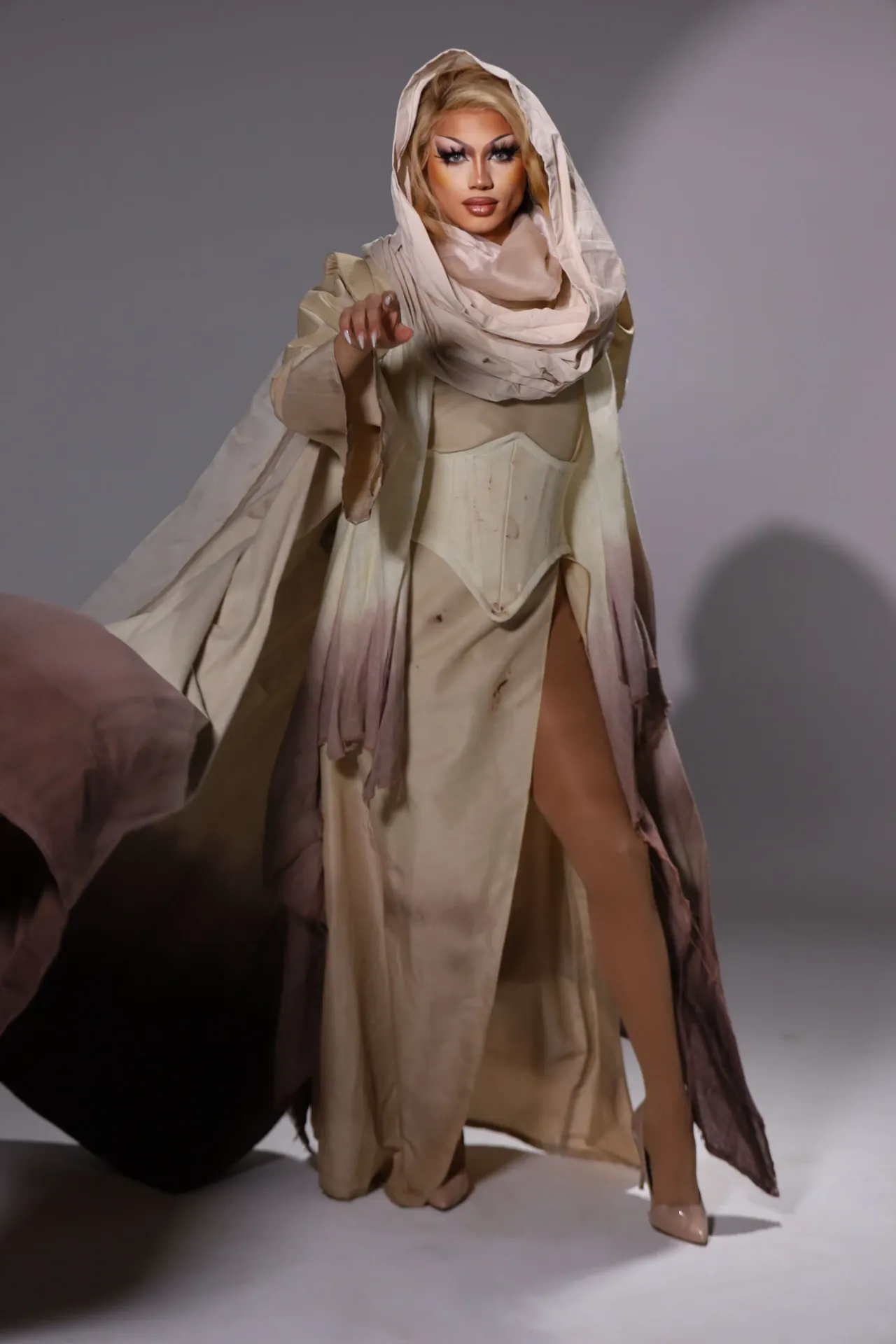 Drag artist and educator Freya Armani in a sculptural cream look